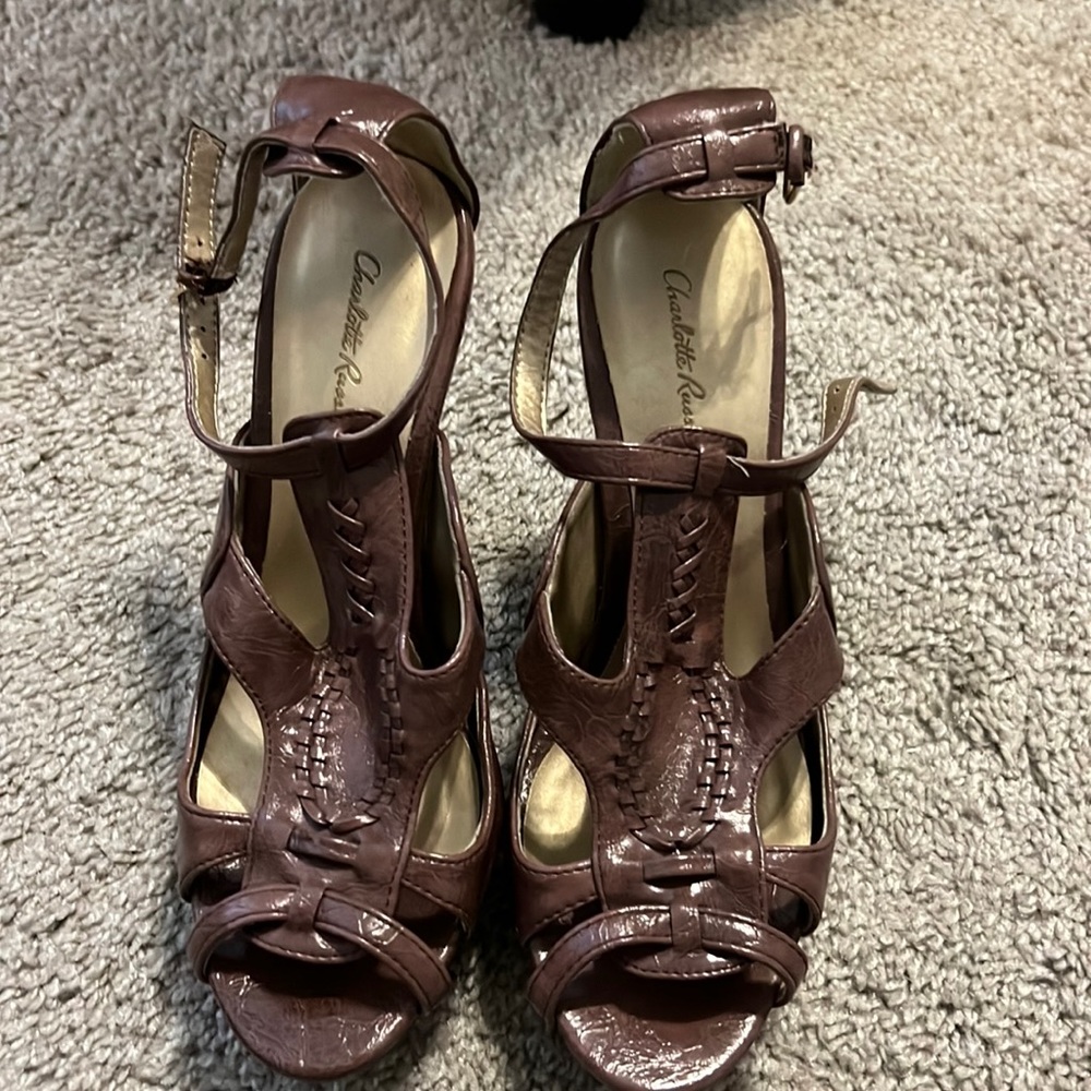 Brown and black platform heels